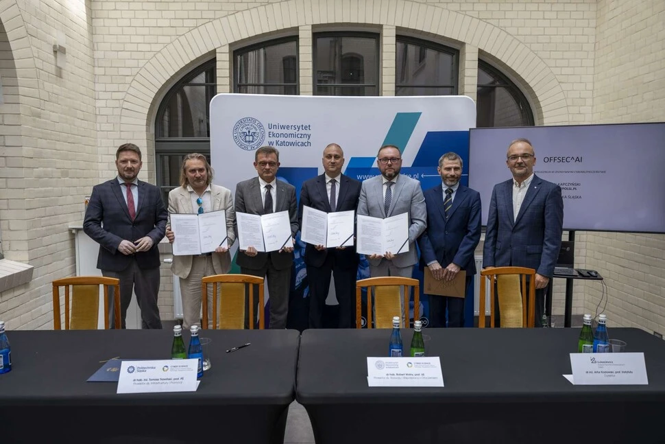 7 men in suits holding documents in their hands